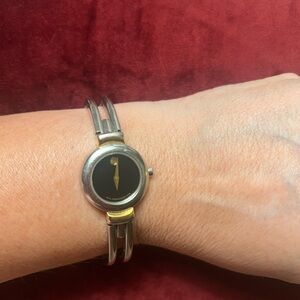 Movado Women's Black and Gold Watch
